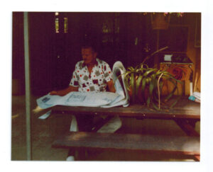 Architect and master builder reviewing custom estate plans and structural specifications